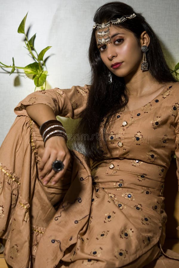 Beautiful Indian Girl with Makeup and a Fashionable Hairstyle Poses Stock Image - Image of femininity, hair: 204590481 Beautiful Indian Girl with Makeup and a Fashionable Hairstyle Poses Stock Image - Image of femininity, hair: 204590481
