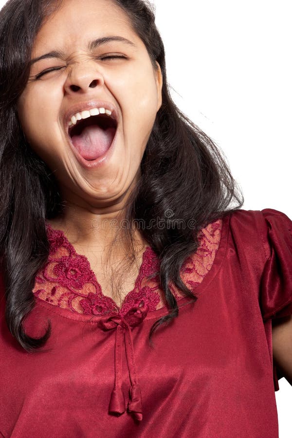 Beautiful indian girl taking yawning