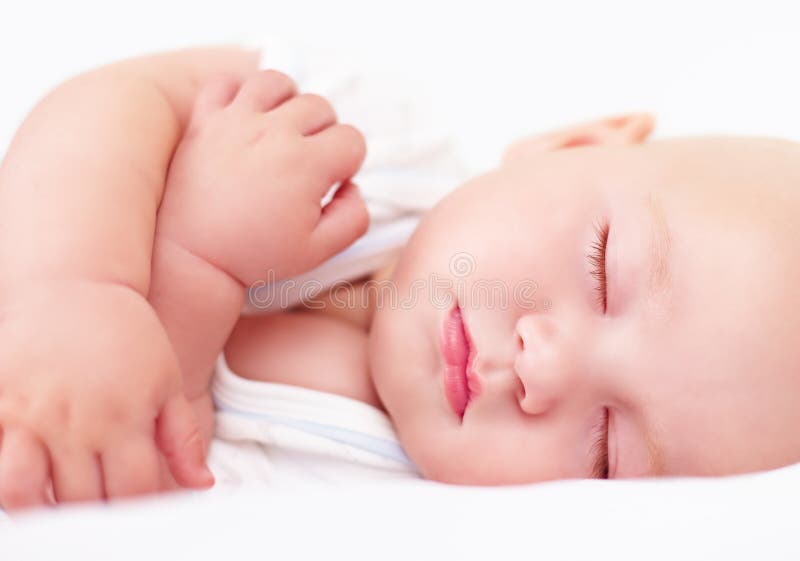 Beautiful infant baby sleeping, four months old