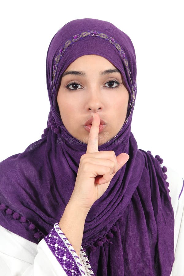 Beautiful islamic woman wearing a hijab asking for silence royalty free stock photography Beautiful islamic woman wearing a hijab asking for silence royalty free stock photography