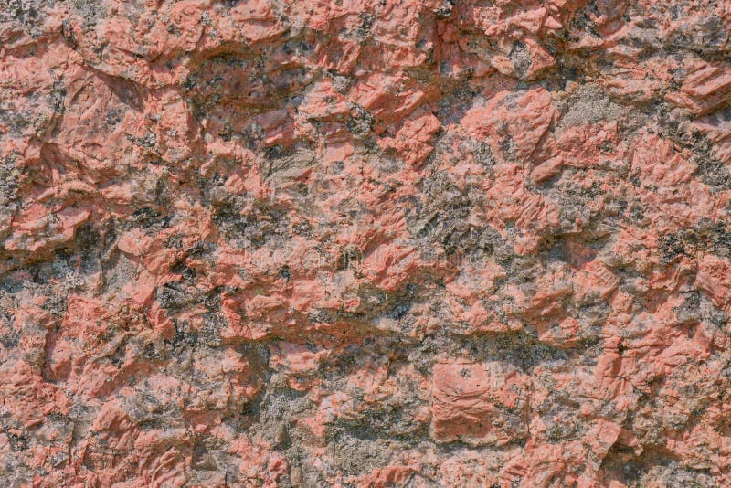 Beautiful karalovogo color stone with a creative seasoned lichen on a boulder texture - abstract background photo