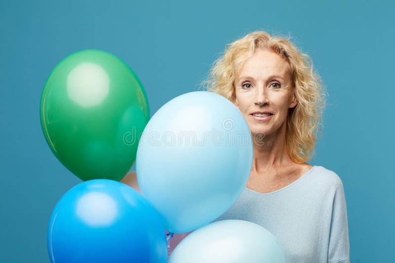 Beautiful lady with colorful helium balloons royalty free stock photo Beautiful lady with colorful helium balloons royalty free stock photo