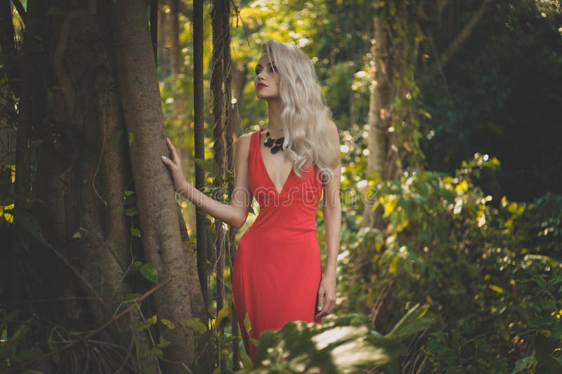 Beautiful lady in tropical forest