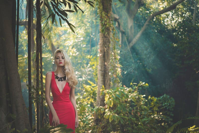 Beautiful lady in tropical forest