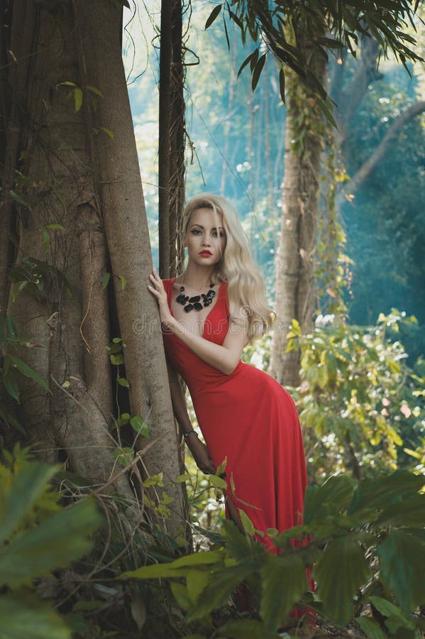 Beautiful lady in tropical forest