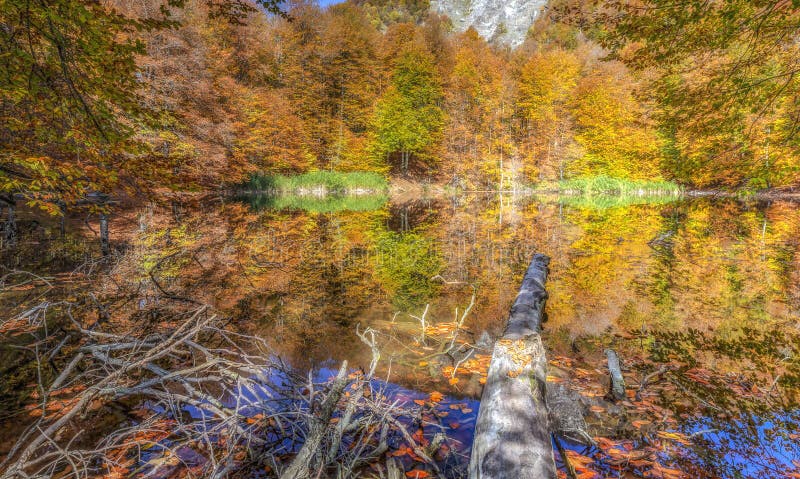 Beautiful lake in the autumn high in the mountains