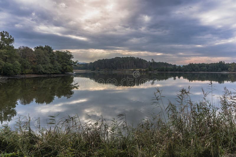 Beautiful lake reflection in forest Slovakia Europe