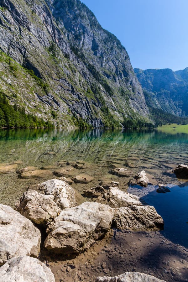 Beautiful Landscape Of Alpine Lake With Crystal Clear Green Water And