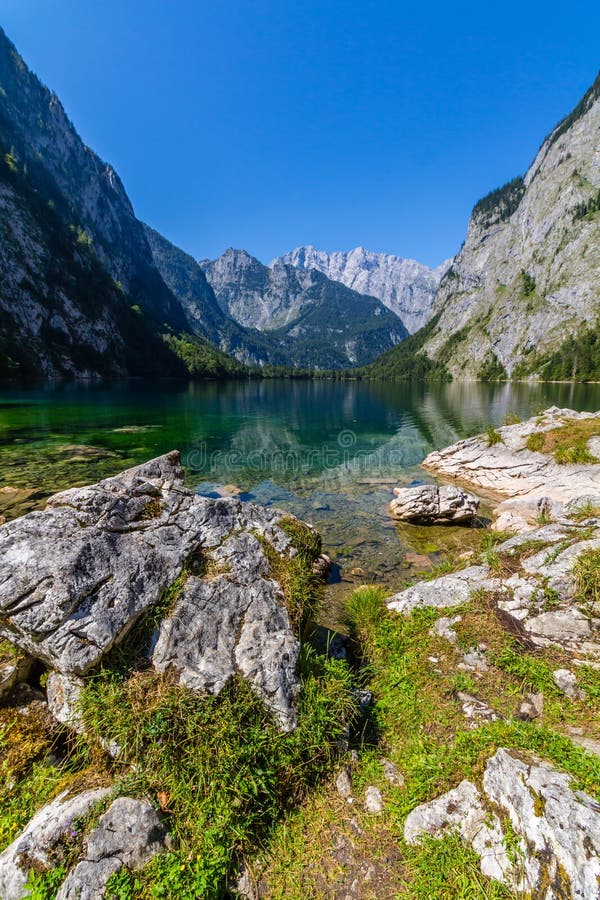 Beautiful Landscape Of Alpine Lake With Crystal Clear Green Water And