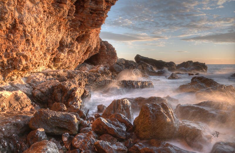 Beautiful landscape blue sea and waves near the rocks