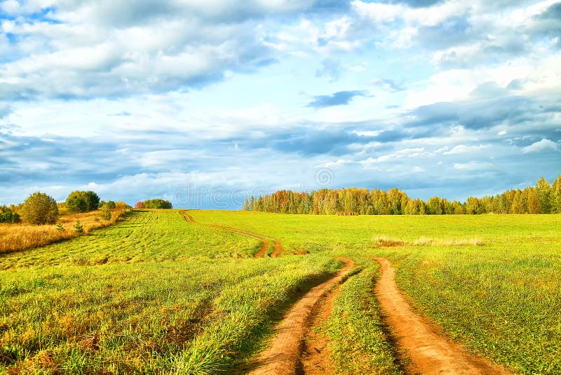 Car In The Meadow And Clouds In The Sky On A Summer Or Autumn Stock