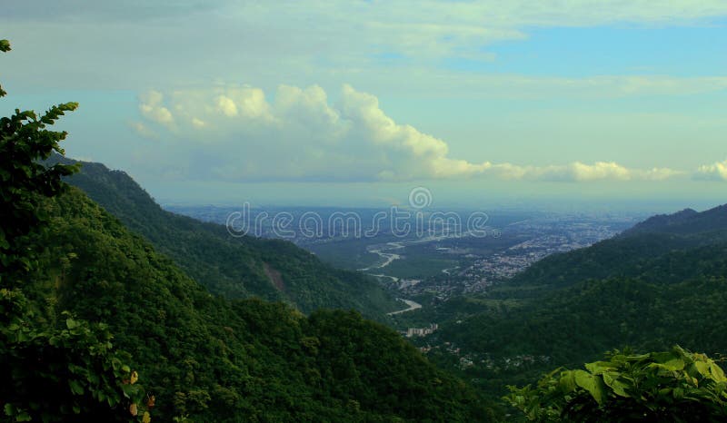 Beautiful landscape with moun Beautiful landscape with mountains, forest and pinetains, forest and pines, river,blue sky & clouds.