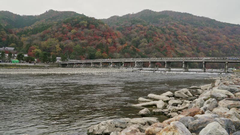 Beautiful landscape of river ripples and the famous Togetsu-kyo Bridge