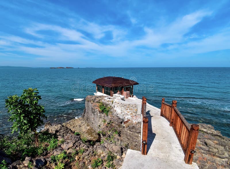 Beautiful landscape view of  bungalow, wooden bridge, hill, blue sky and sea at Gaw Yan Gyi island, Myanmar.