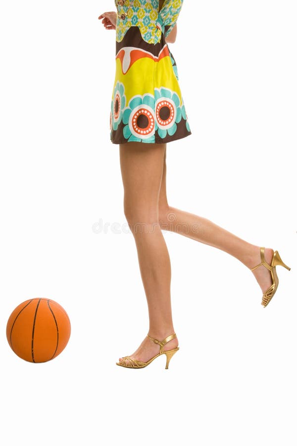 Beautiful legs on high heels with basketball