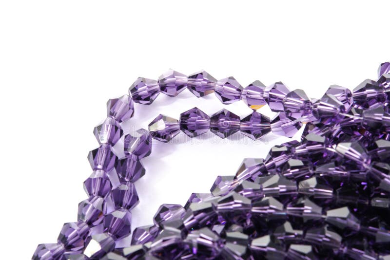 Beautiful Light purple Glass Sparkle Crystal Isoalted Beads on white background. Use for diy