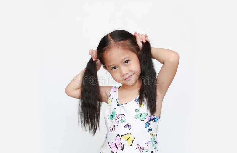 https://thumbs.dreamstime.com/b/beautiful-little-asian-child-girl-holding-pigtail-white-background-portrait-smiling-children-two-pigtails-beautiful-little-164977281.jpg