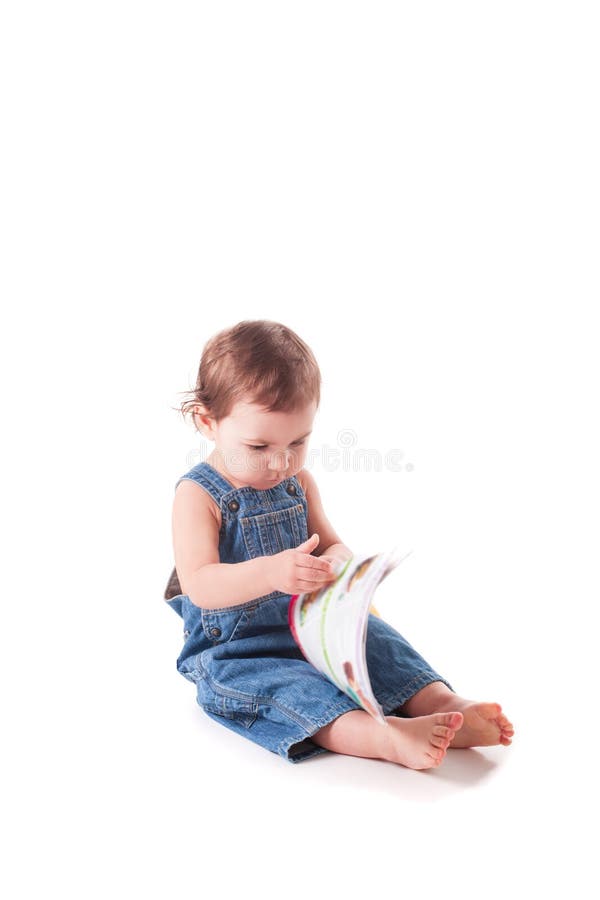 Beautiful little baby with a book stock photography Beautiful little baby with a book stock photography