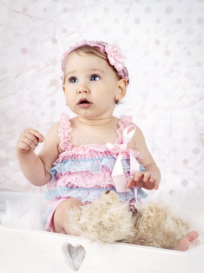 Beautiful Little Baby Girl with Plush Teddy Bear Stock Photo - Image of ...