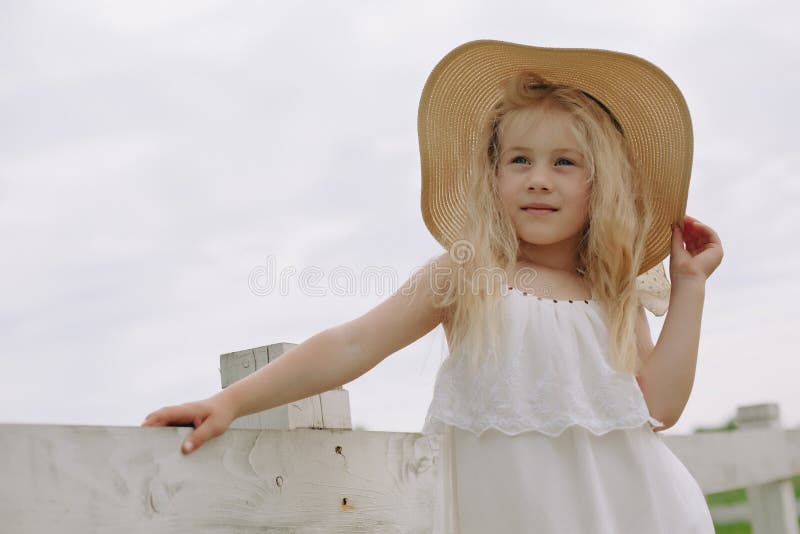 Beautiful Little Blonde Girl on a Ranch. Stock Photo Image of sister