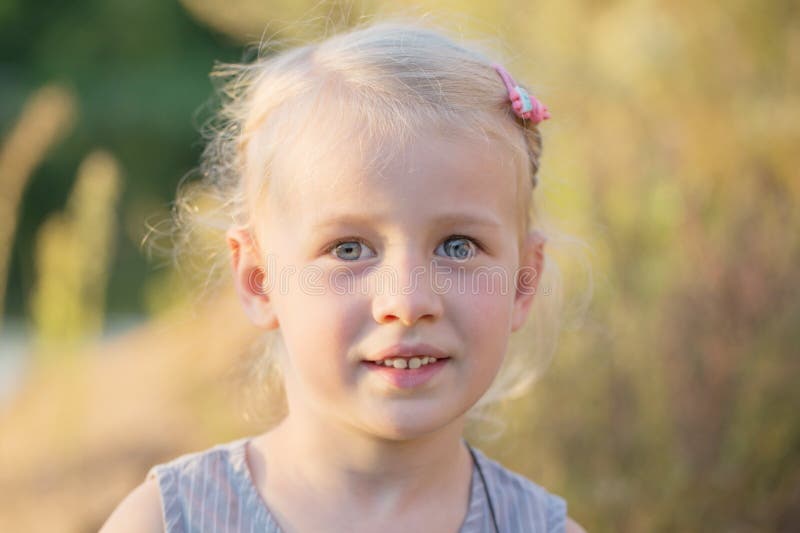 Beautiful  blonde smile  girl close up