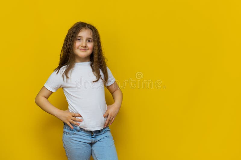 Beautiful Little Fashion Model On Yellow Studio Background Stock Image ...