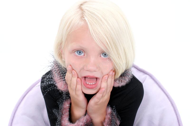 Beautiful Little Girl with Hands on Face Looking Shocked stock photo Beautiful Little Girl with Hands on Face Looking Shocked stock photo