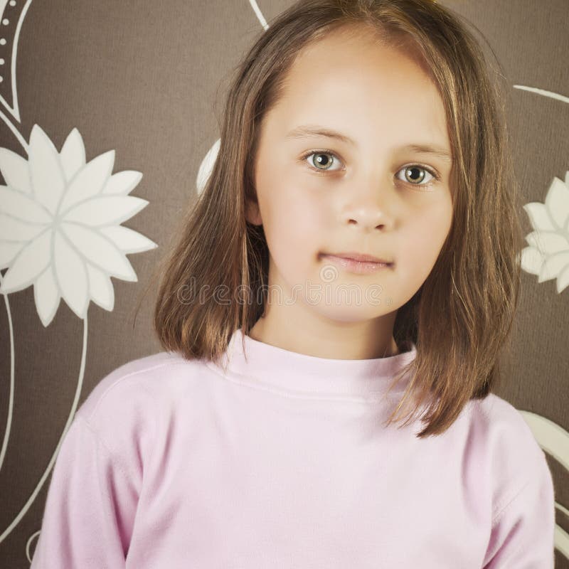 Beautiful little girl with long brown hair