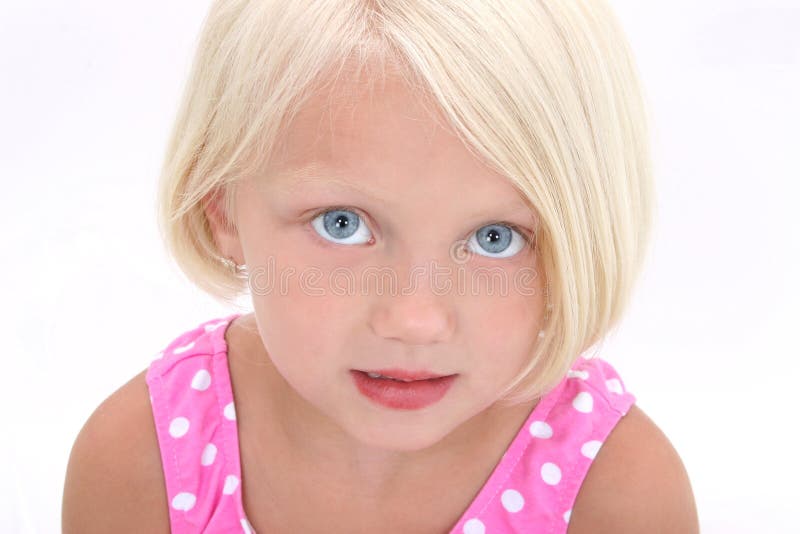 Beautiful Little Girl In Pink Swim Suit Close Up. Shot in studio over white with the Canon 20D.