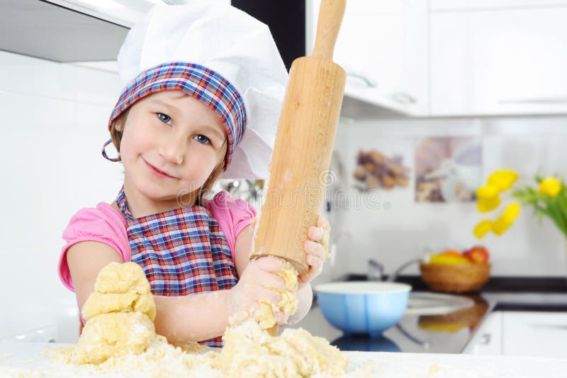 Beautiful little girl with rolling pin stock photography Beautiful little girl with rolling pin stock photography