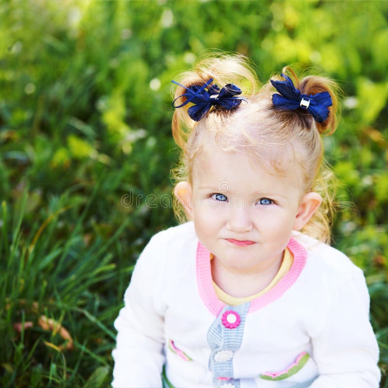 Beautiful Little Girl Smiling. Park Outside the House. Advertising ...