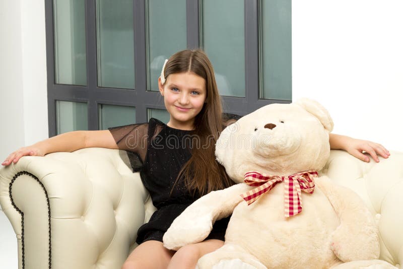 Doll Baby Girl Incest Porn - Little Girl on Sofa Hugging Teddy Bear. Stock Photo - Image of play,  innocence: 224562080
