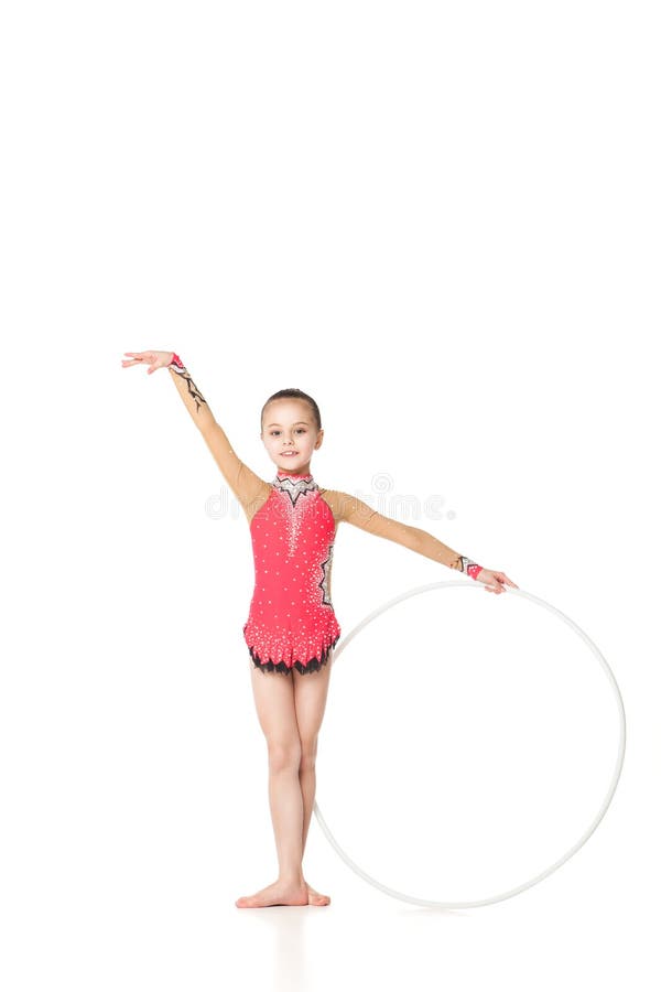 Beautiful little gymnast with the hoop