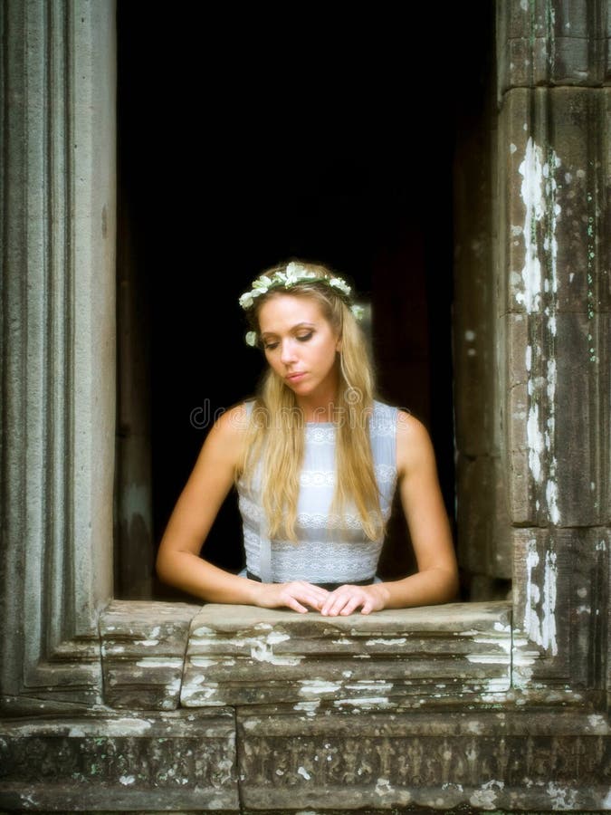 Beautiful, Lonely Fairytale Princess Waiting at Tower Window