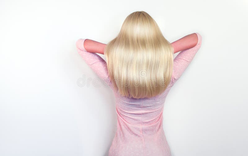 Beautiful long blond Hair. Beauty woman with luxurious straight white hair. Sexy blonde Model girl with Healthy Hair.