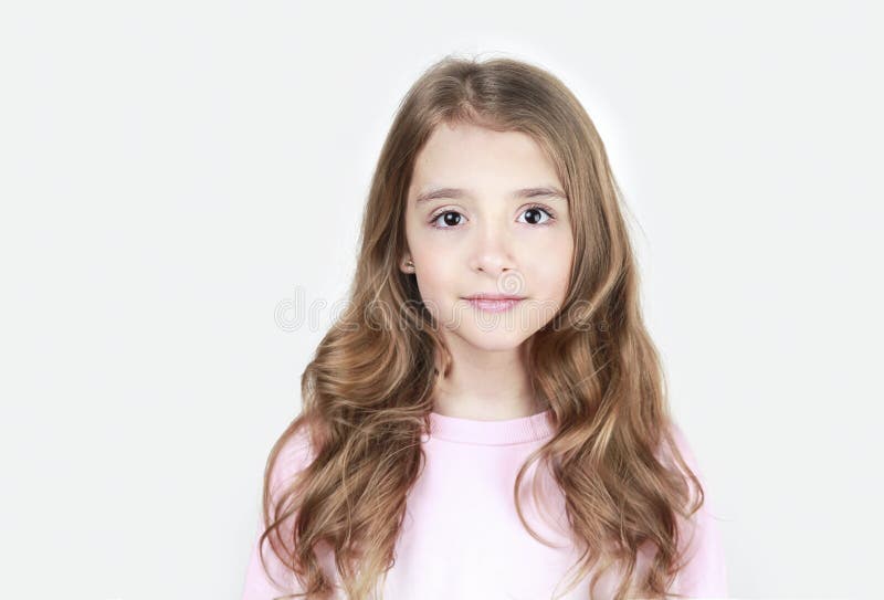 Beautiful long hair smiling face child girl teenager closeup portrait,caucasian female kid school age. Beautiful long hair smiling face child girl teenager closeup portrait,caucasian female kid school age