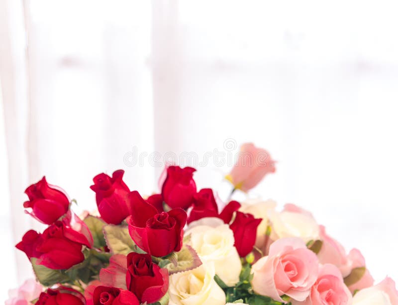 Beautiful luxury bouquet of of plastic roses flower on white background with copy space .Sweet celebration festival valentine`s stock images Beautiful luxury bouquet of of plastic roses flower on white background with copy space .Sweet celebration festival valentine`s stock images
