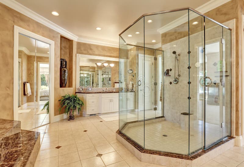 Beautiful luxury marble bathroom interior in beige color stock images Beautiful luxury marble bathroom interior in beige color stock images