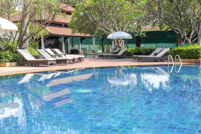 Beautiful luxury swimming pool in tropical hotel pool resort, Travelling in summer season