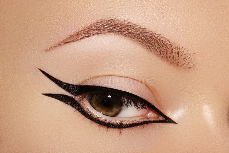 Beautiful Macro of Female Eye with Fashion Black Eyeliner Makeup. Perfect Graphic  Liner Shape. Cosmetics and Make-up Stock Image - Image of minimalism,  female: 178386911
