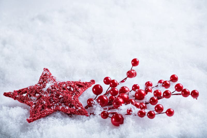 Beautiful magical vintage red star on a white snow background. Winter and Christmas concept.