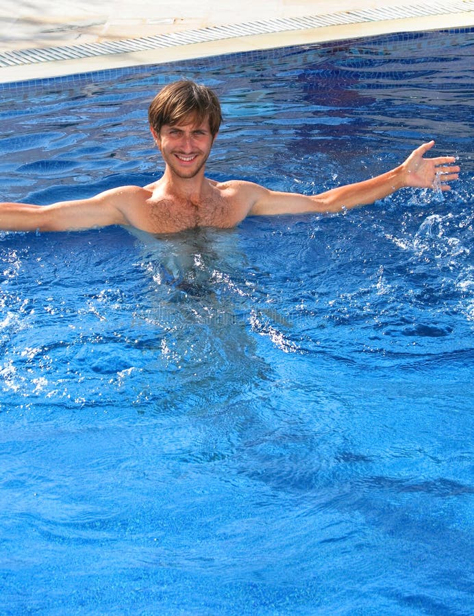 Beautiful man in swimming pool
