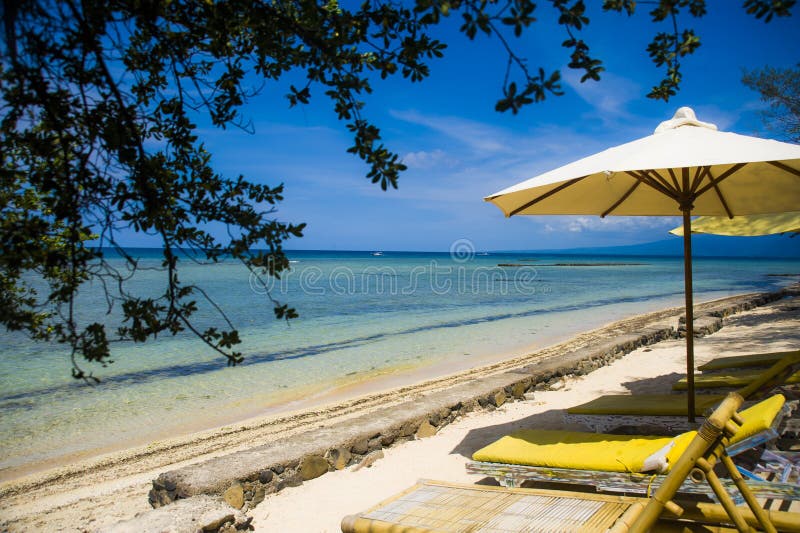 Beautiful marine landscape view of amazing tropical paradise beach with white sand and amazing turquoise color sea water and yello stock images Beautiful marine landscape view of amazing tropical paradise beach with white sand and amazing turquoise color sea water and yello stock images
