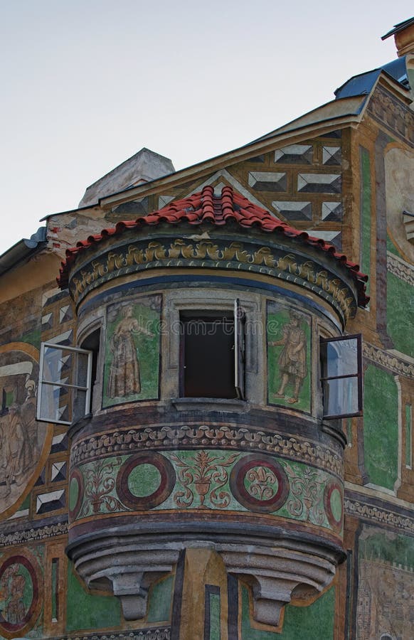 Beautiful medieval balcony with open windows. Telc, Czech Republic