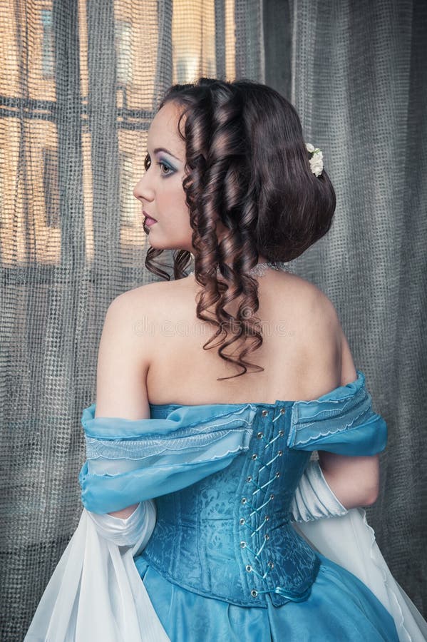 Beautiful medieval woman in blue dress stock photo Beautiful medieval woman in blue dress stock photo