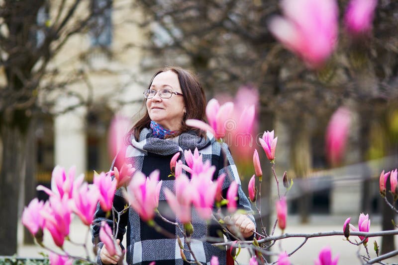 MKiddle aged woman in Paris on a spring day stock photography MKiddle aged woman in Paris on a spring day stock photography