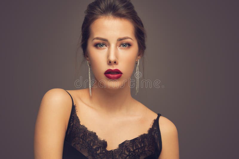 Beautiful Model Girl with Elegant Hairstyle . Woman with Red Lips and ...