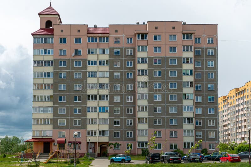 Beautiful modern multi-storey building in a new area of the city. View of the windows of an apartment panel house. An ordinary