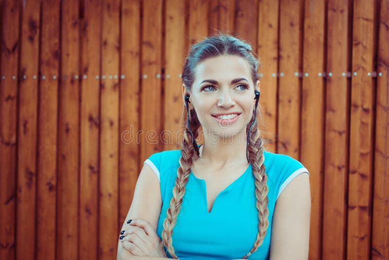 Beautiful modern sportswoman with arms crossed stock photography Beautiful modern sportswoman with arms crossed stock photography