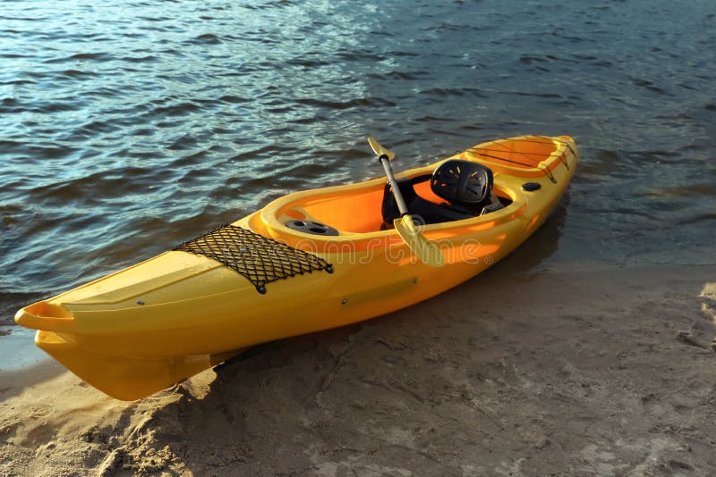 Beautiful Modern Yellow Kayak with Paddle on Beach Stock Photo Image of equipment, lake 234320588